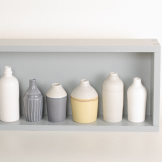 Hand thrown bottles, in white, grey, black and mustard, inspired by morandi paintings.