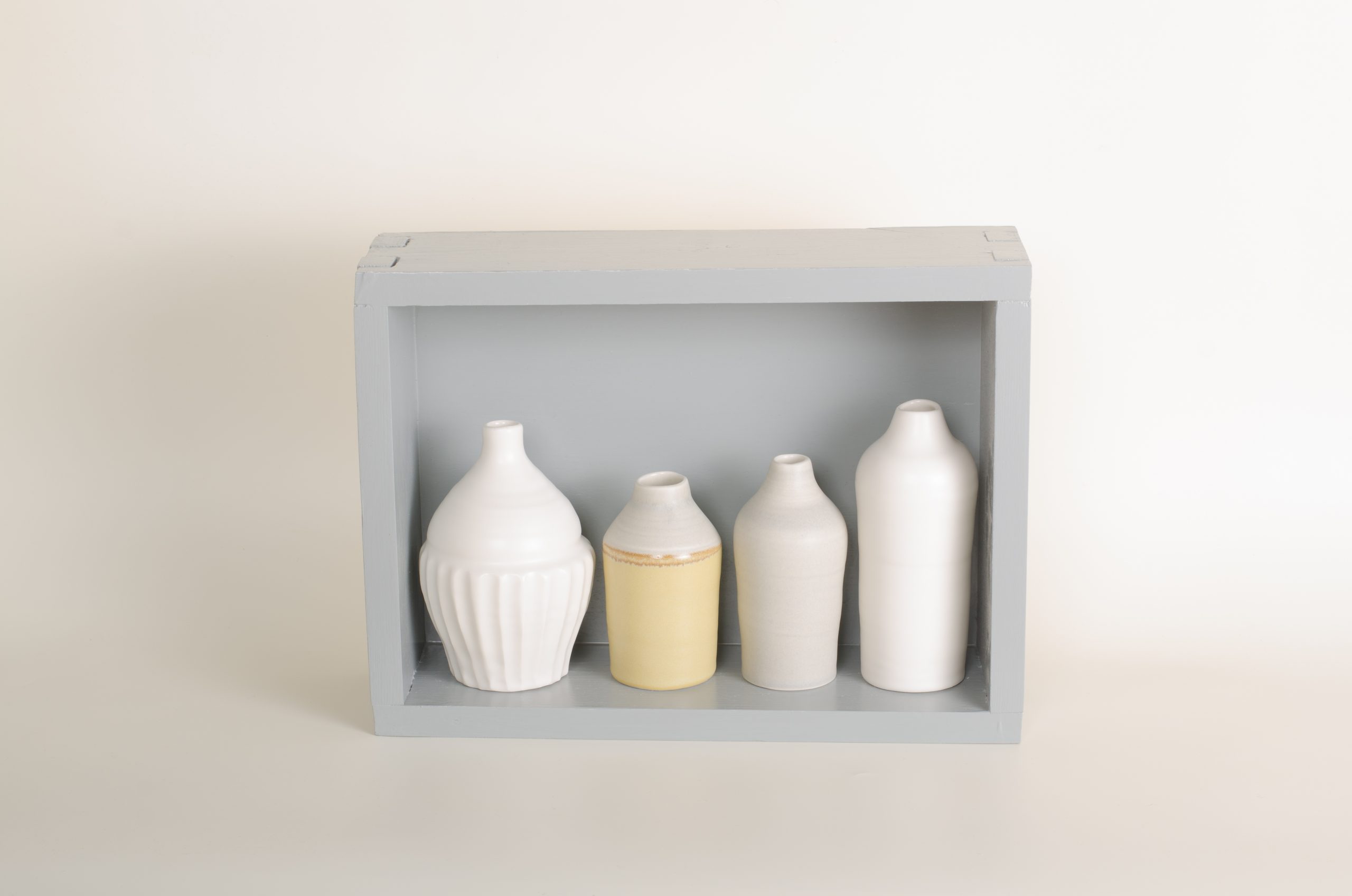 Hand thrown bottles, in white, grey and mustard, inspired by morandi paintings.