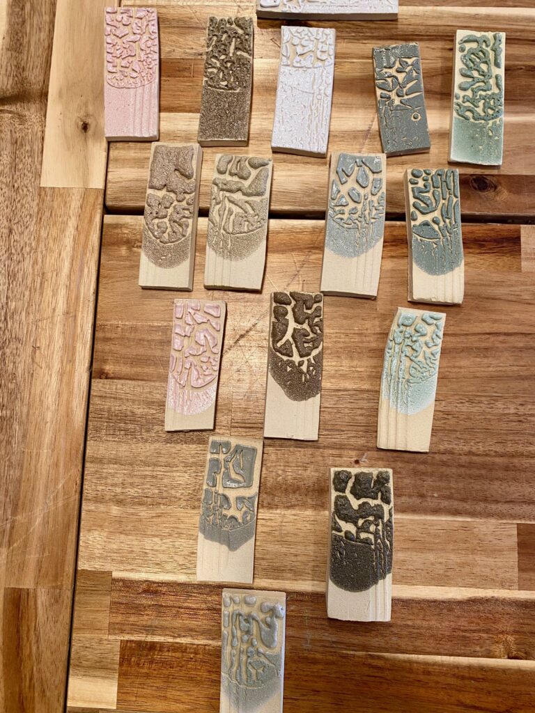 Crawl glaze tests with various colouring oxides
